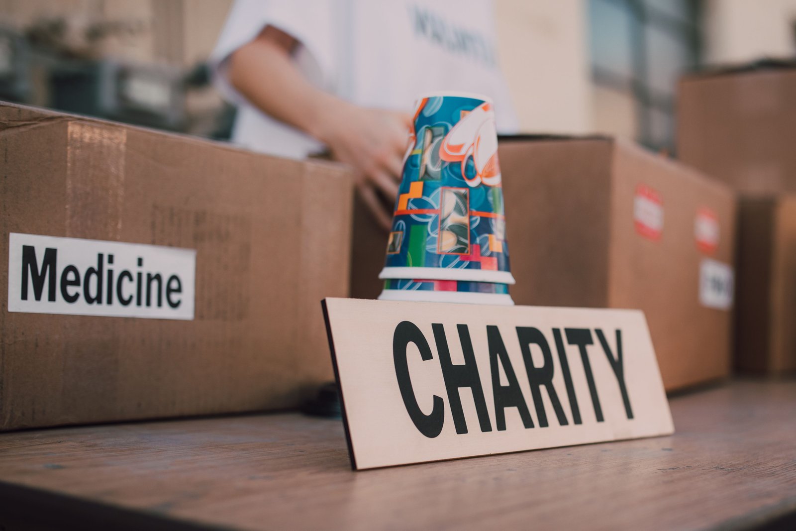 Organised charity materials for community distribution